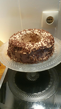 brownish beige ring cake on glass platter