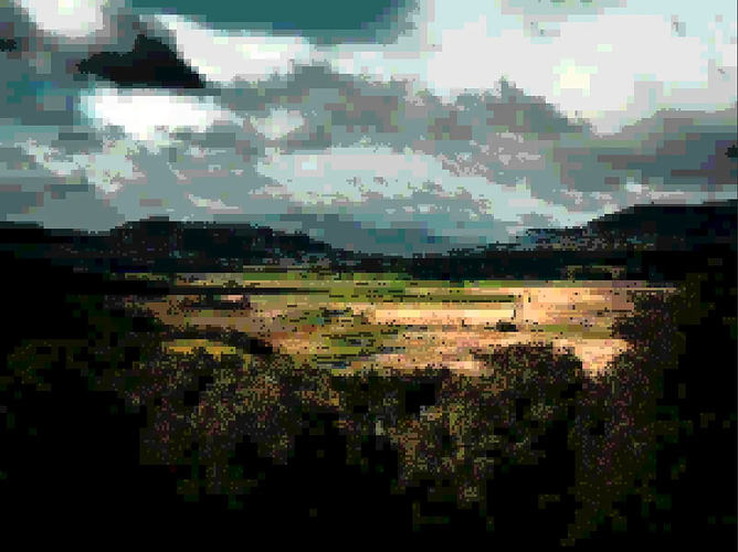The Scottish Highlands, rendered in an odd, highly pixelated style. Green and golden fields sit between rolling hills, illuminated by rays of sunshine fighting through the clouds. Colour is rendered at low resolution with a low colour count, although this is somewhat hidden by much higher resolution light and shadow.