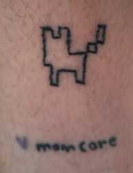Vibrating Bitsy Cat Tattoo, and the word Momcore with a purple heart below