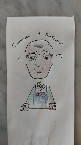 pen and crayon sketch of a depressed looking bald man wearing an apron with huge bags beneath the eyes and wrinkles. It's captioned with the phrase "existence is suffering"