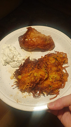white plate with white dip, fried chicken and hash-browns