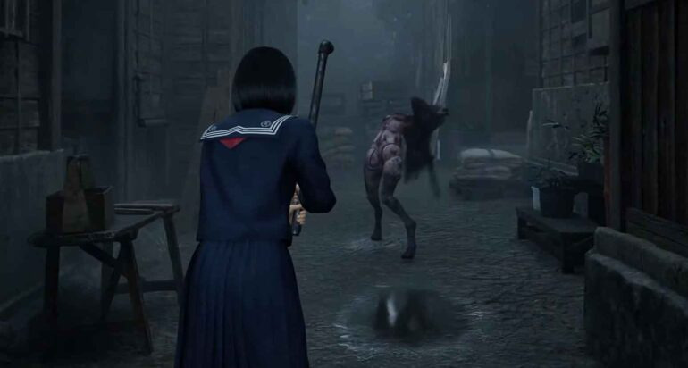 Screenshot from the game Silent Hill F. Protagonist Hinako stands in a defensive posture, holding up a rusted metal pipe between herself and an approaching mannequin enemy. The mannequin stands with a contorted posture, twisted backwards in an unnatural manner with long black hair falling towards the ground. The scene is set in a grey, foggy street.